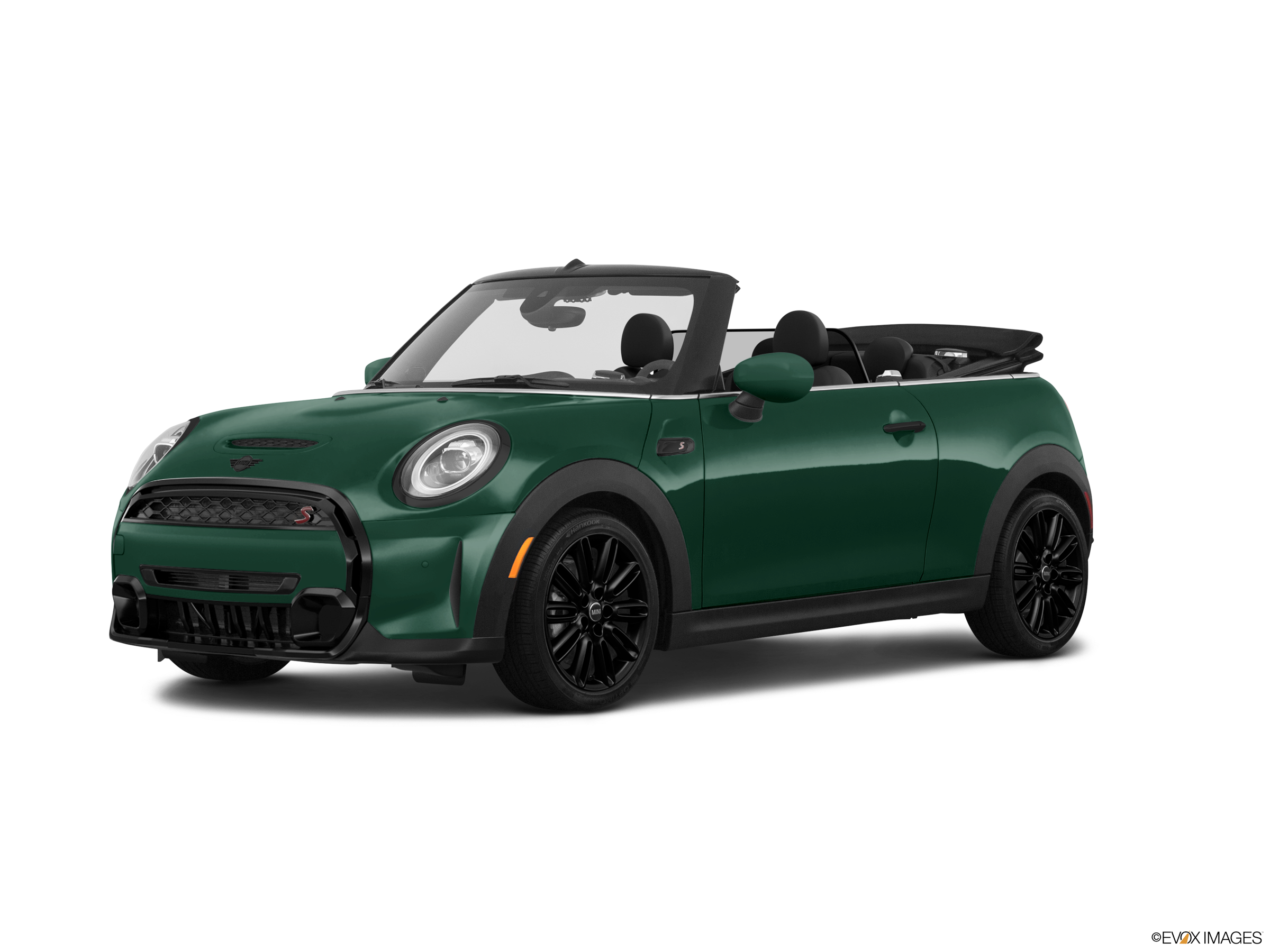 a-green-mini-convertible-car