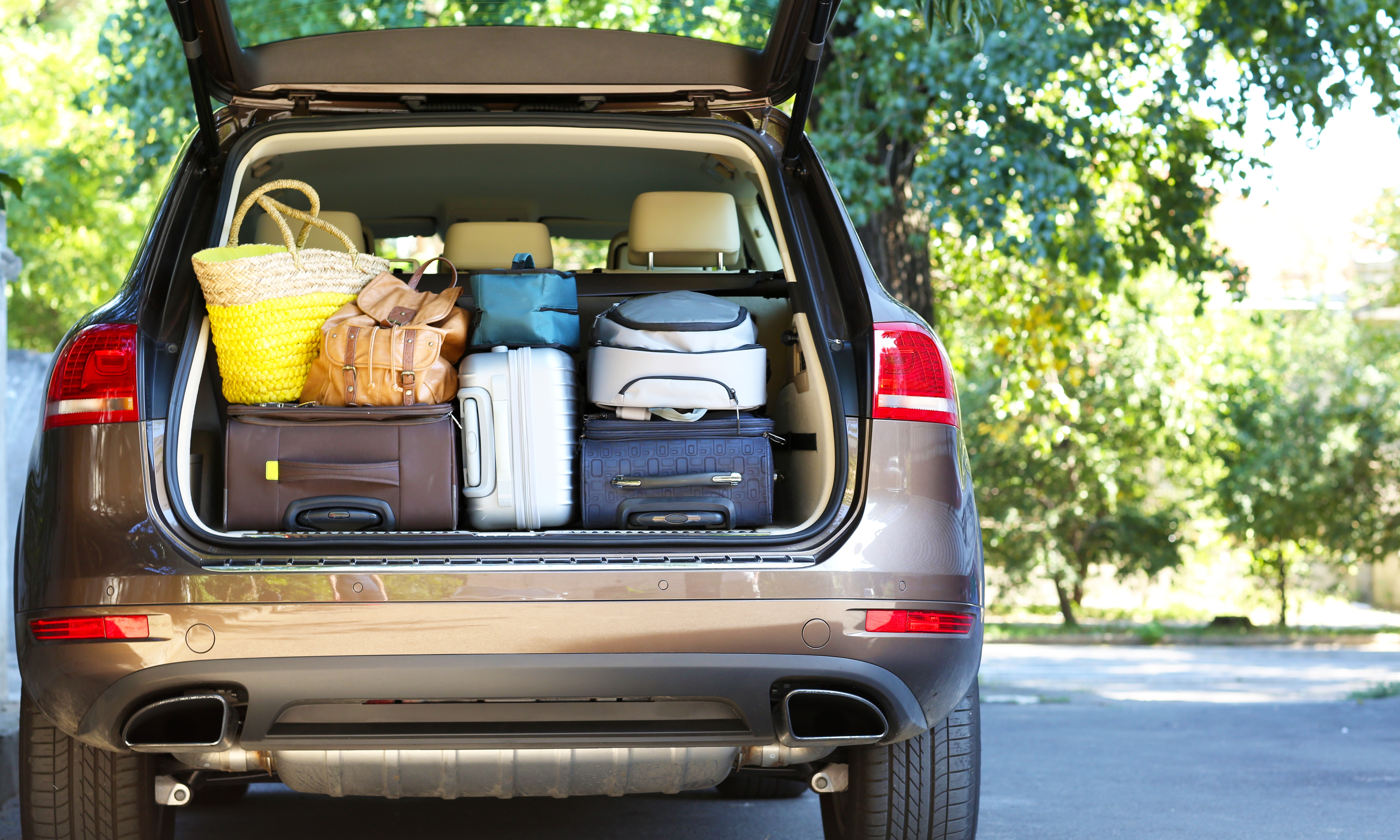 back of a suv filled with luggage