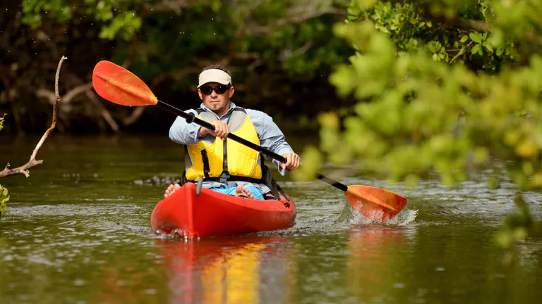 man kayaking