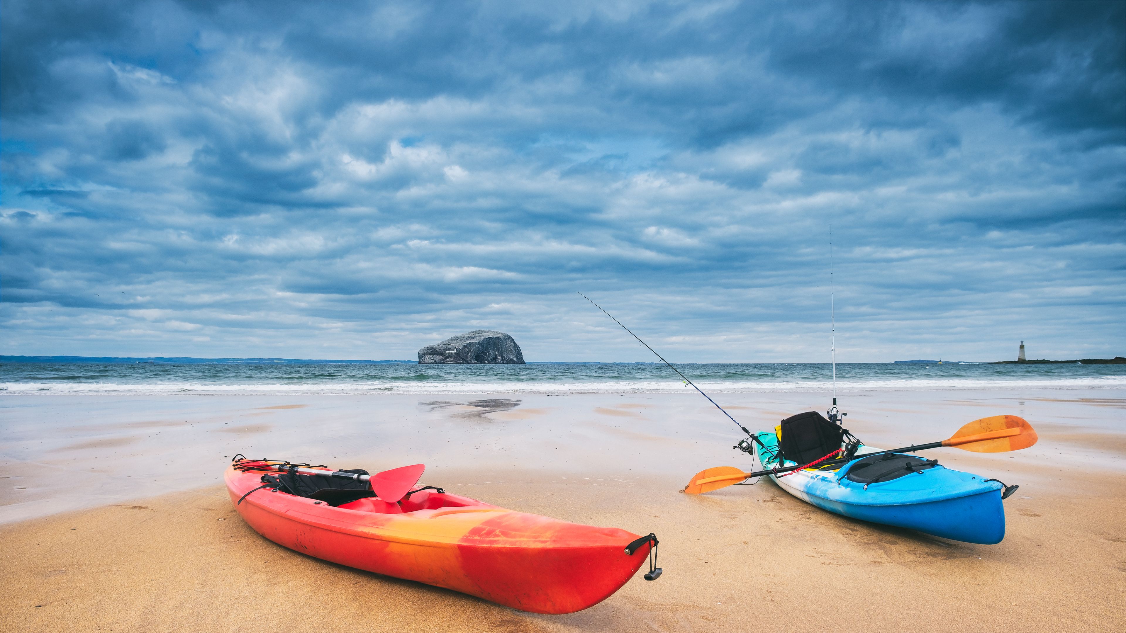 Two kayaks on the beach Two kayaks on the beach