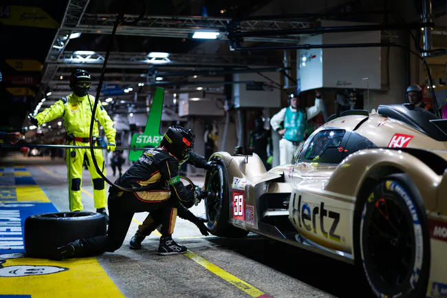 car at the pit stop le mans