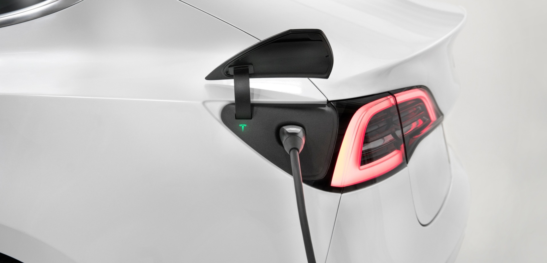 Tesla Car Charger Plugged In