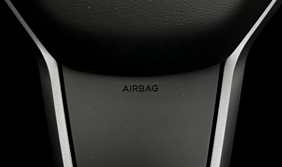 Interior view of Model 3 with visible 'Airbag' label